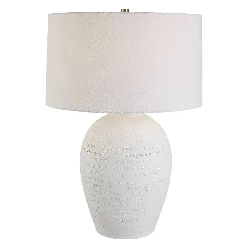 Track lighting for creating a moody atmosphereReyna Table Lamp