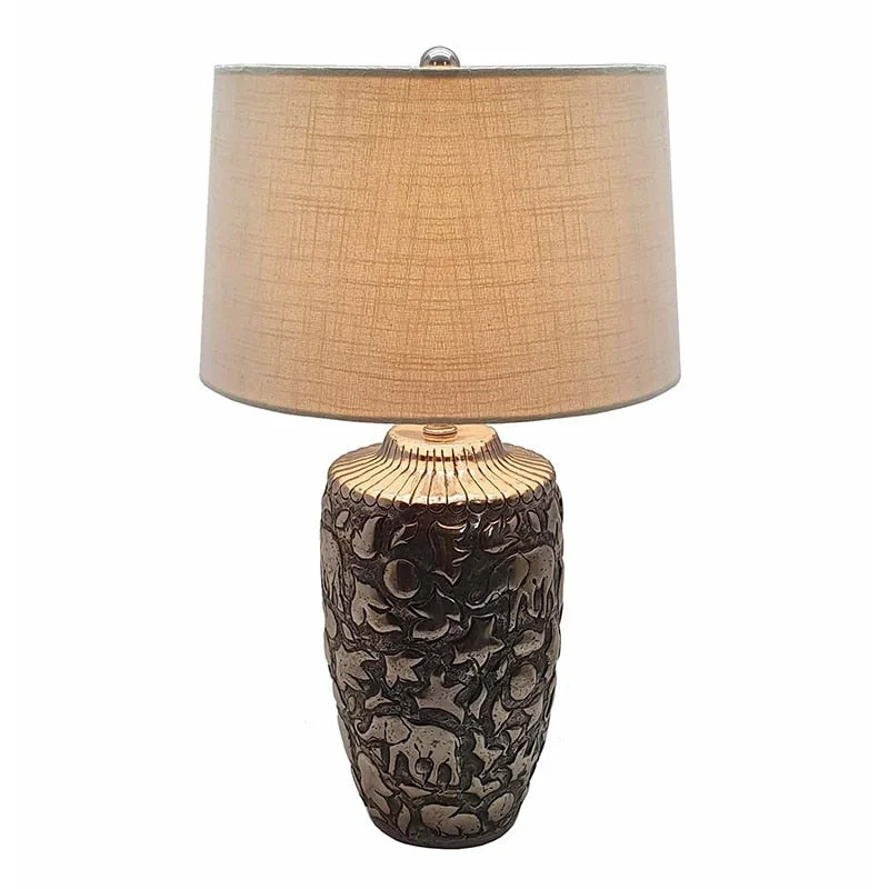 glass table lamps with a frosted surface for soft light diffusionglass table lamps with a frosted surface for soft light diffusion15x15x25.5" Aluminum Embossed Table Lamp With Shade