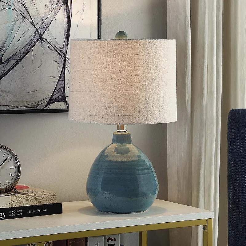 gothic style table lamps with dark finishes for a mysterious lookgothic style table lamps with dark finishes for a mysterious lookStyleCraft Cameron Ceramic Turquoise Table Lamp - Beige Hardback Linen Shade